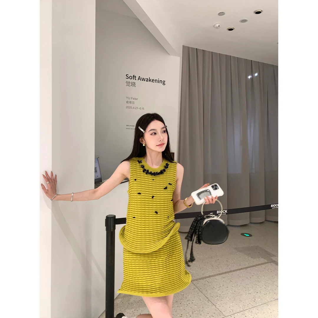 区区欧阳 鱼骨波浪下摆钉珠半身裙女夏季新款设计感小众复古短裙