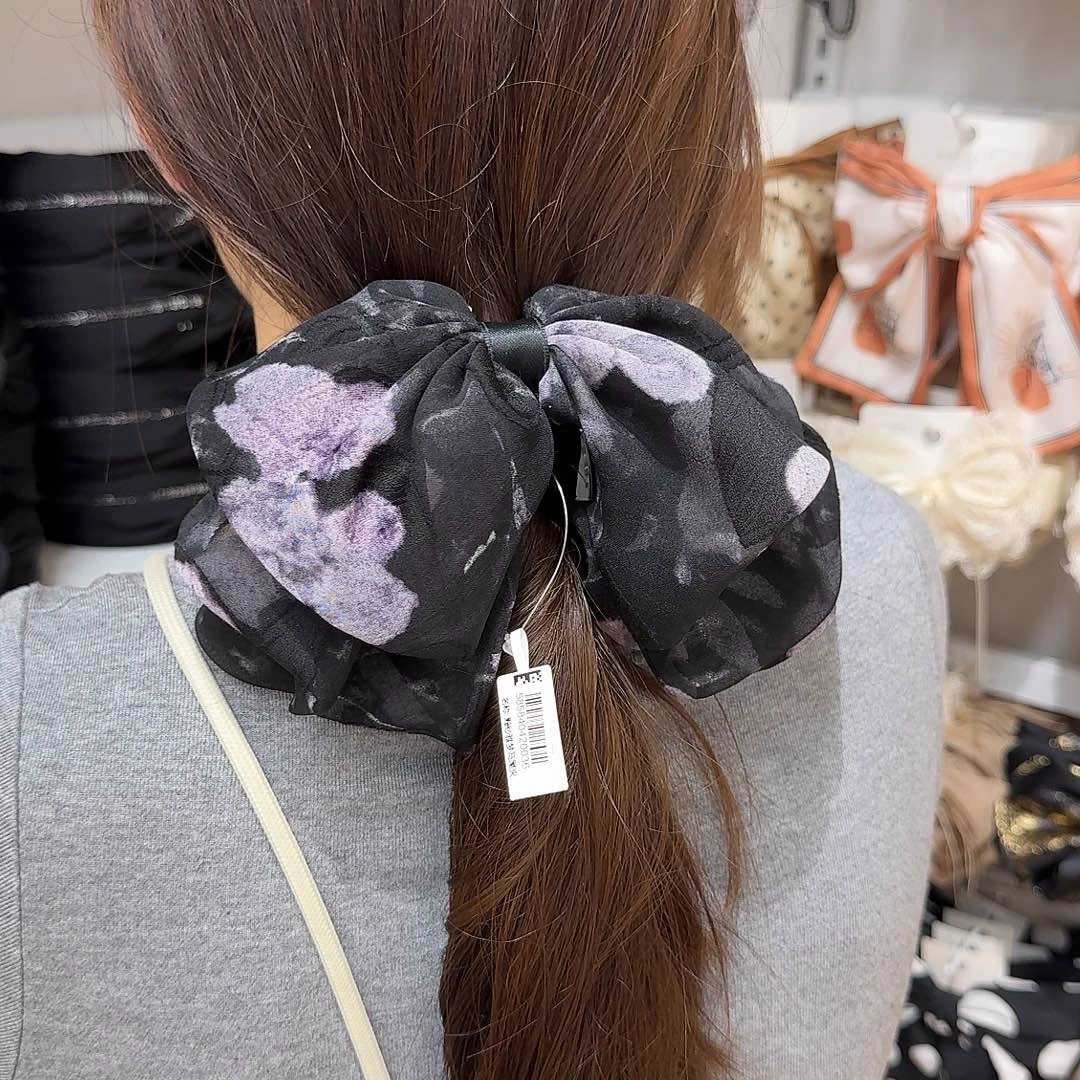 黑紫色马尾抓蝴蝶结