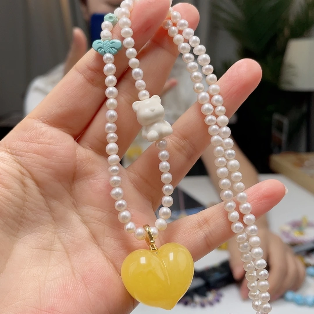 银S925镶嵌琥珀裸石蜜蜡吊坠