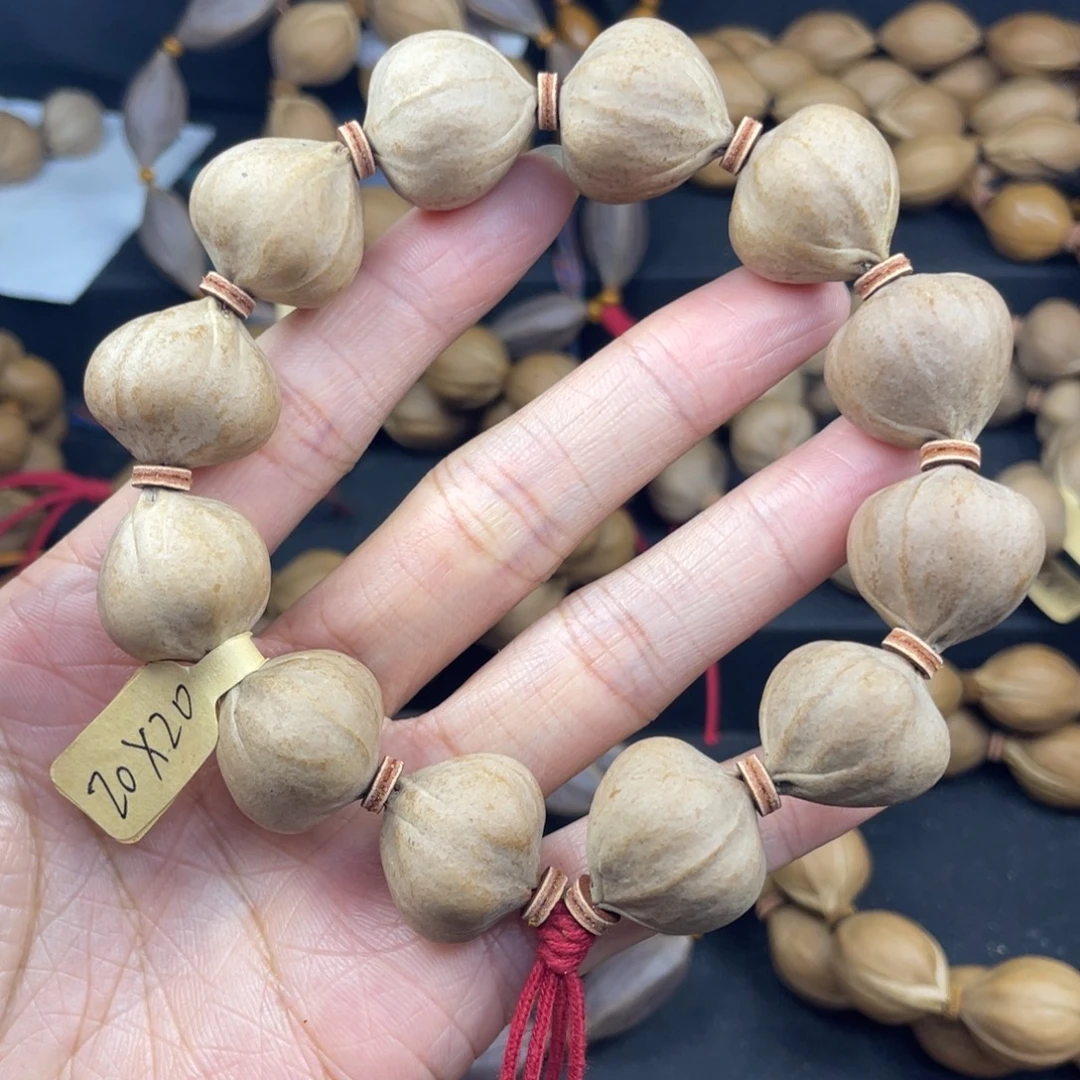 003橄榄核三花蒜头20*20