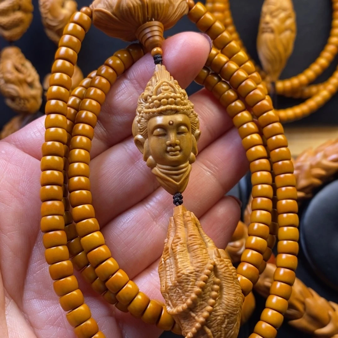 橄榄核手串观音脖挂