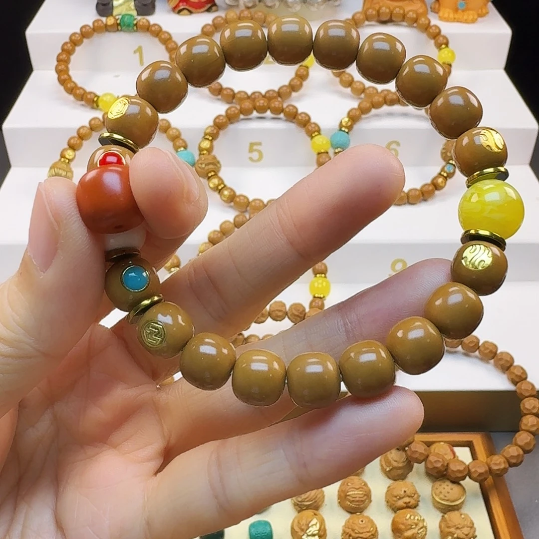 我***。猴头核桃吊坠猴头手串