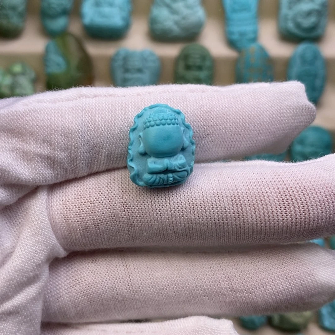 曦***瑶未镶嵌绿松石雕刻件