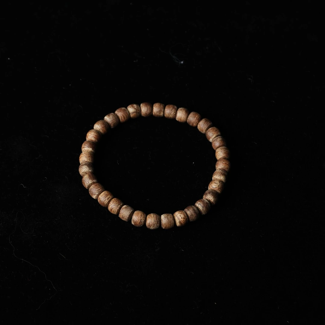 A4659达拉干沉香软丝土沉9分沉老型珠0.65x0.5cm 2.93g