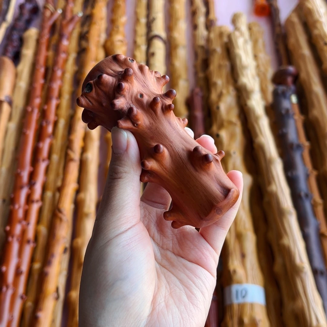 喆***贵州檬子木手把件