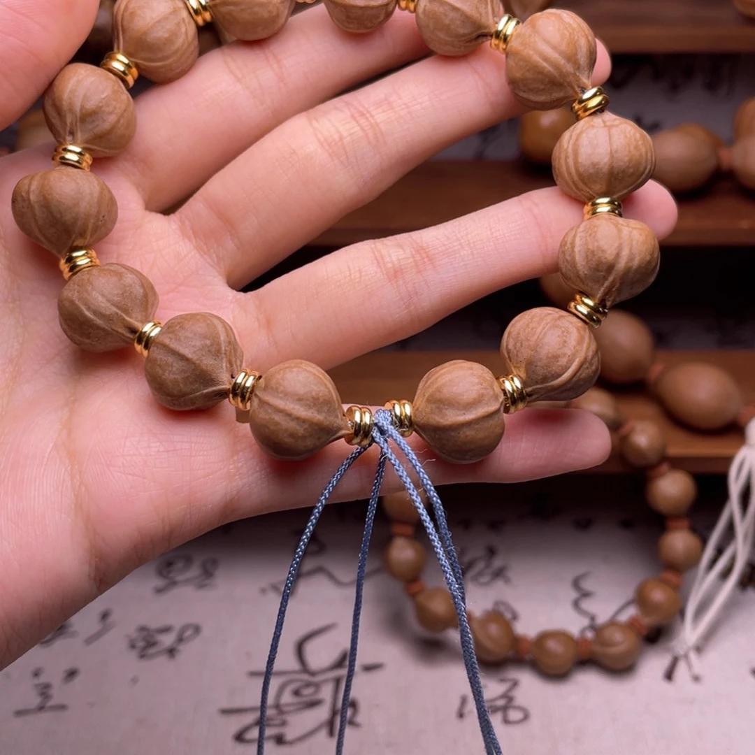 橄榄核手串S****光蒜头手串14