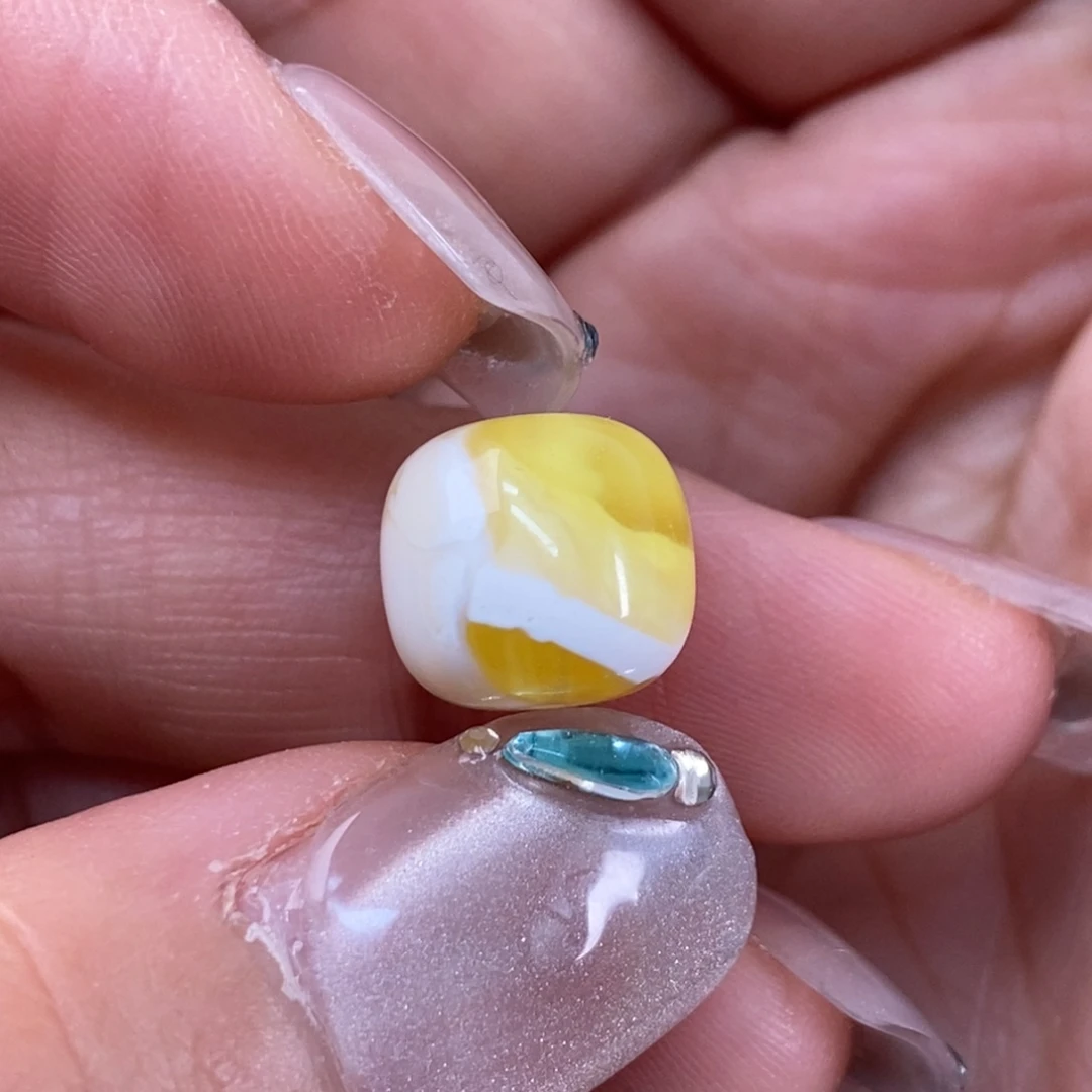 蜜蜡裸石未镶嵌打****?蜜蜡