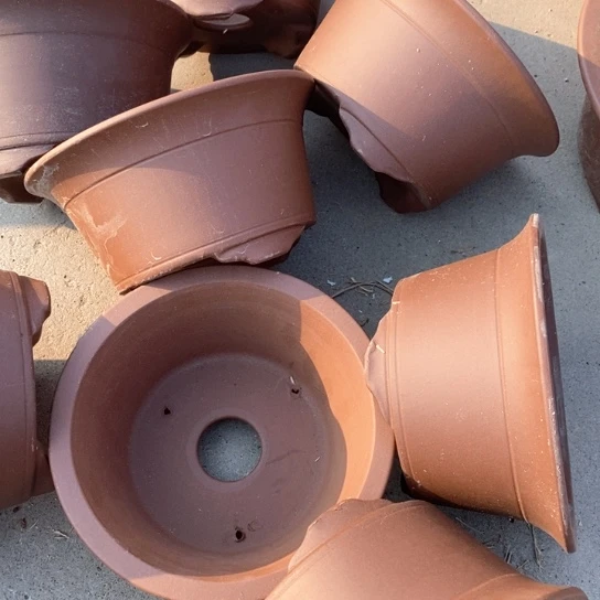 紫砂花盆100.8。     18.5-9.5