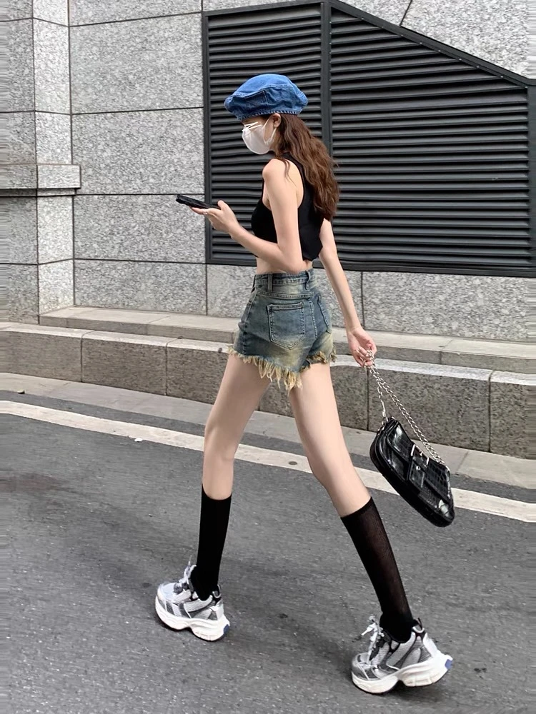 18106辣妹复古流苏牛仔短裤女夏季设计感阔脚裤子百搭A字热裤