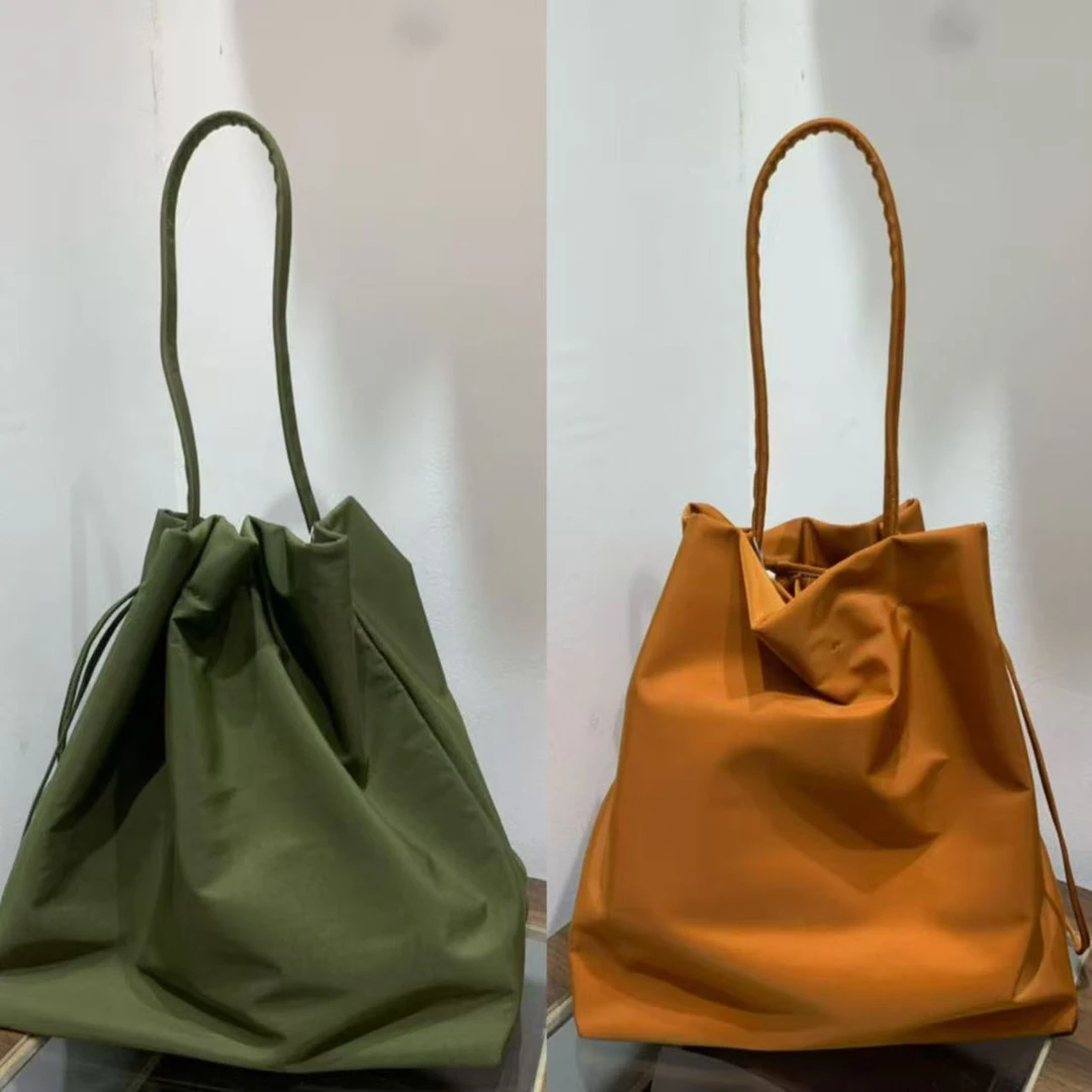 【秀秀新品 】极简手提单肩抽绳托特包简约