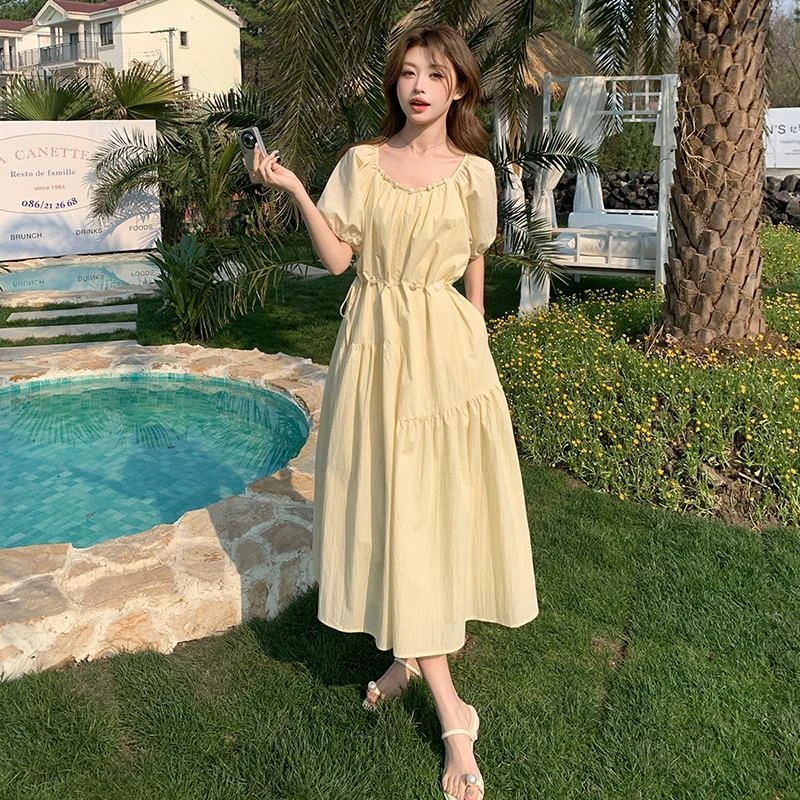 黄色法式珠串系带收腰温柔风连衣裙女2025夏季新款浪漫复古A字裙