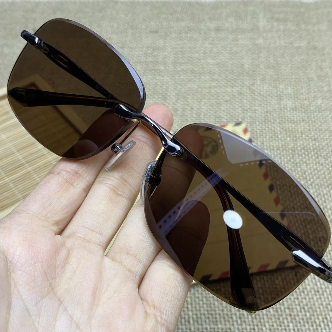 精选高清茶色水晶石男士防紫外线太阳百搭镜中老年时尚无框护目镜