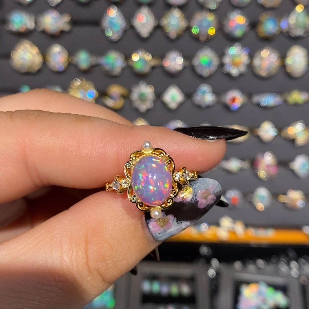 芭***呐欧泊银S925镶嵌戒指