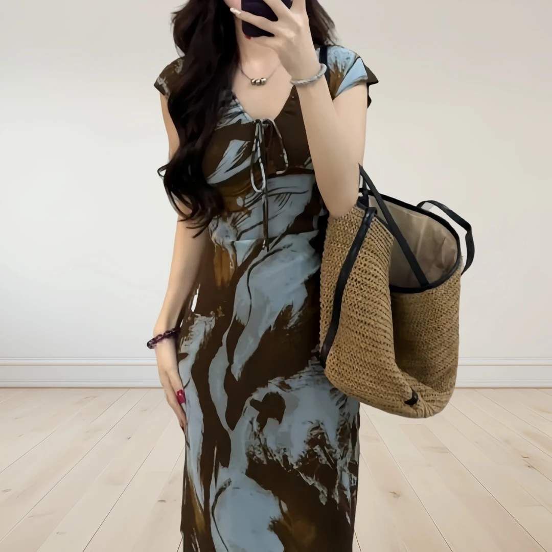 优雅气质斜裁显瘦连衣裙女2025夏季新款修身设计感包臀短袖长裙子