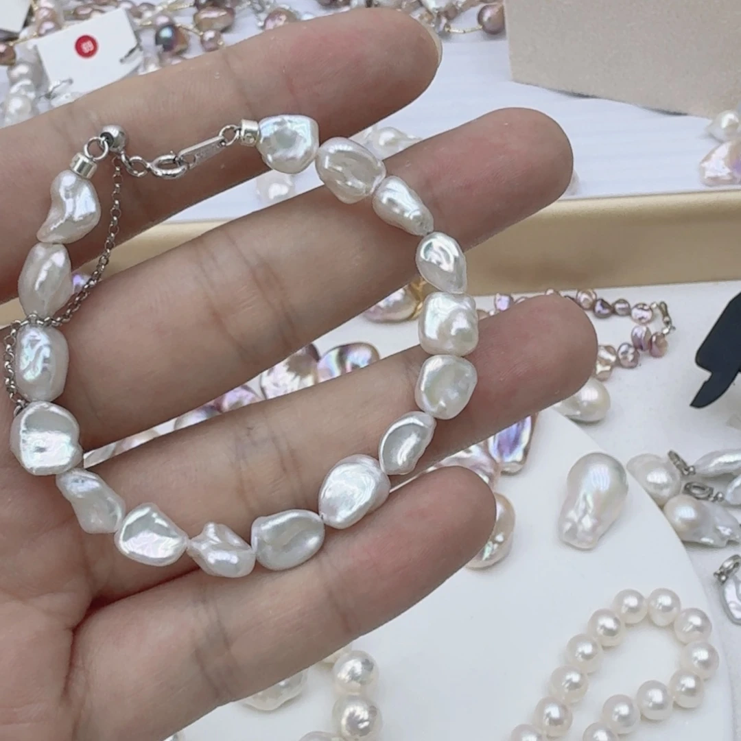 银S925镶嵌淡水珍珠耳饰蔡*