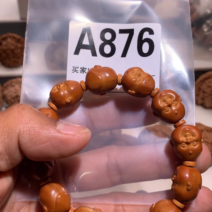 桃核把件Y**U文玩橄榄核