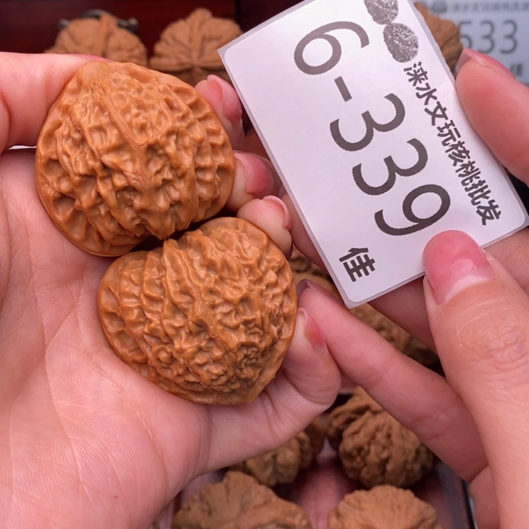 文玩核桃把件40金牛