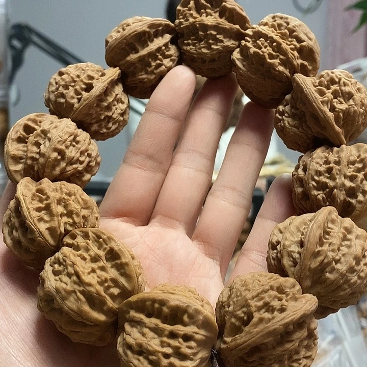 文玩核桃把件37无名大耳朵手持黄