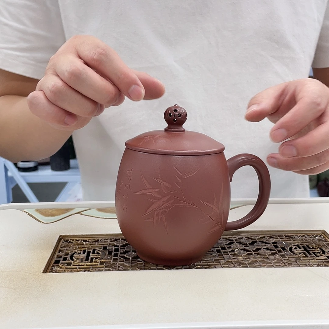 紫砂茶杯龙蛋镂空