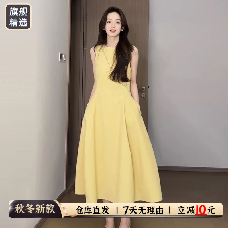 多巴胺无袖背心吊带黄色连衣裙子女夏季2025新款流行爆款掐腰长裙