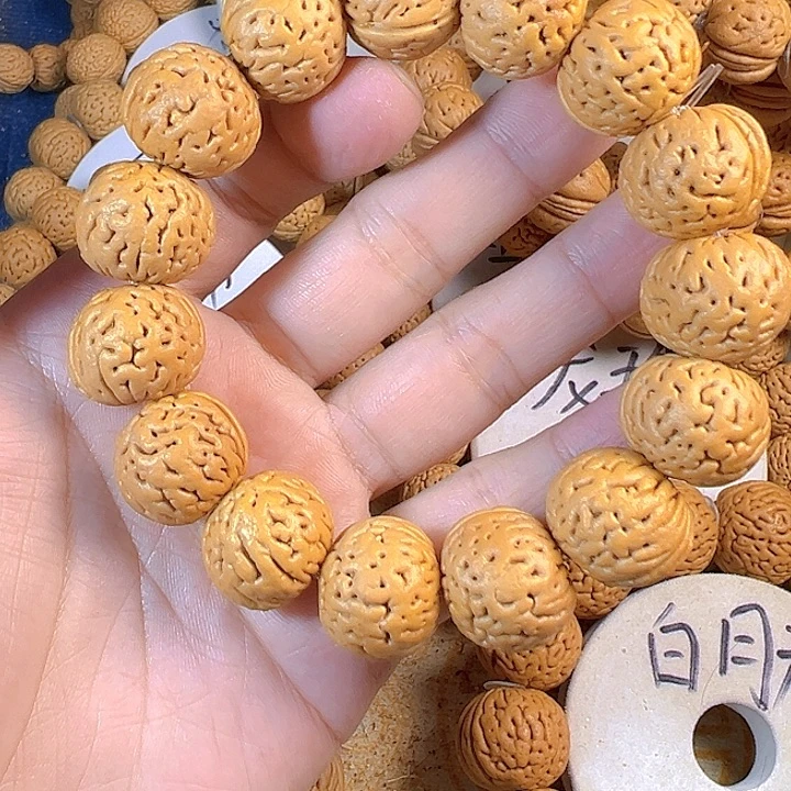 怎***儿桃核吊坠20盘锦奶豆