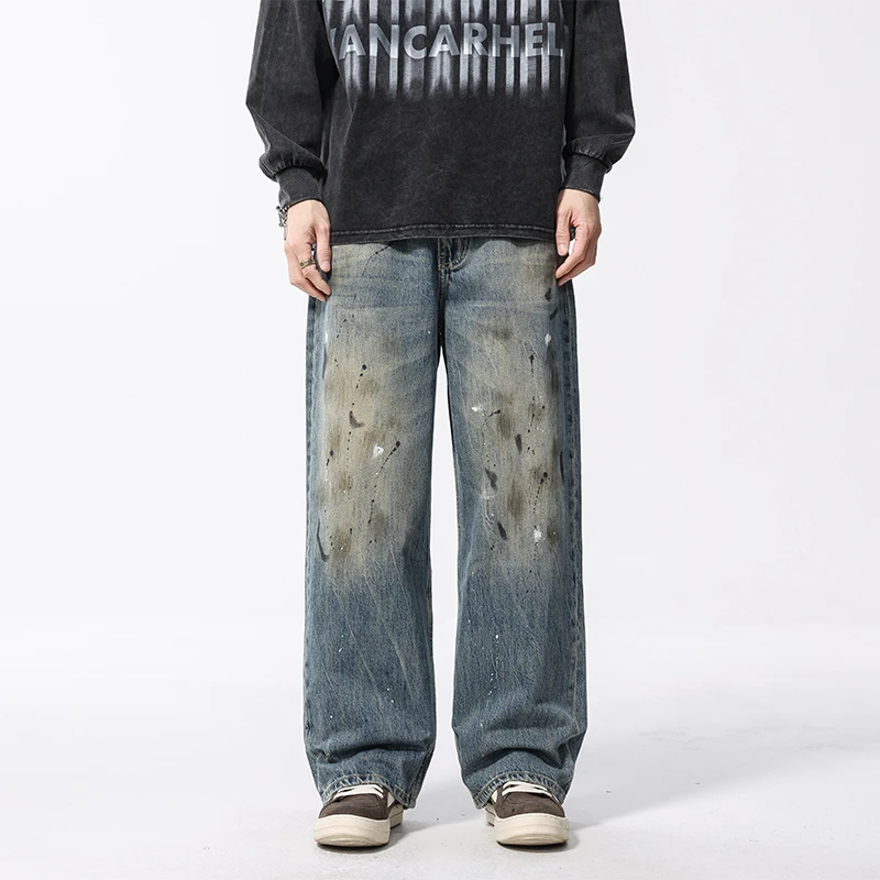 7021美式高街春装泼墨擦脏做旧牛仔裤男士宽松阔腿长裤子大直筒潮