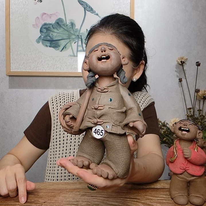 紫砂不规则羲媧娃系列作品挎筐女娃