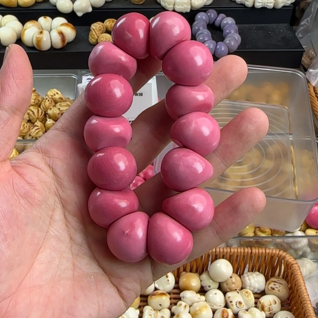 手串菩提根/象牙果微瑕疵粉色蒜瓣手串一条（个别裂）