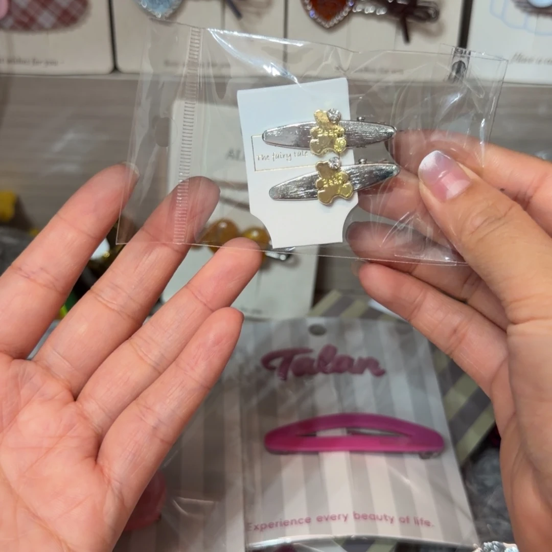椿***3皮质非金属小熊小不点压夹