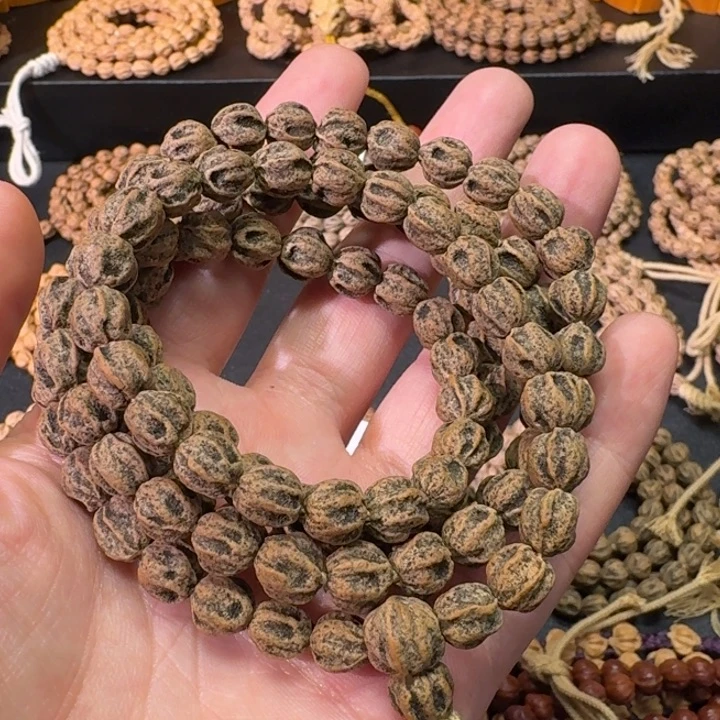 朵***官柏香籽/百香籽吊坠原桩独眼龙老树籽