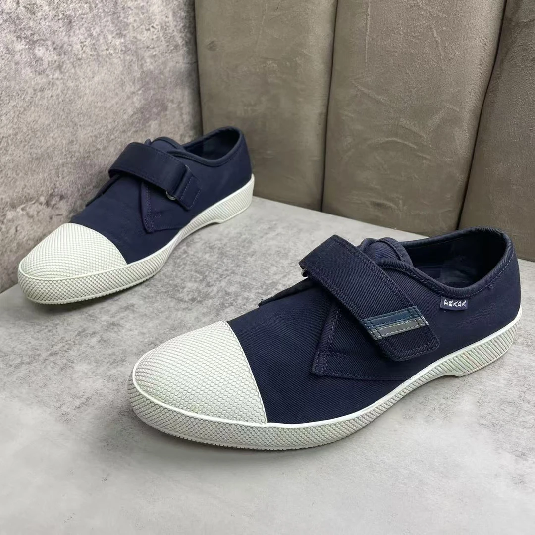 95新 Prada/普拉达 蓝色帆布舒适百搭透气休闲一脚蹬/40码