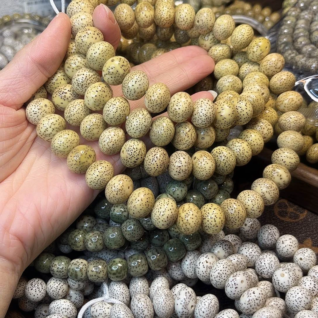 星月菩提吊坠11-14鸡油黄胖苹果108