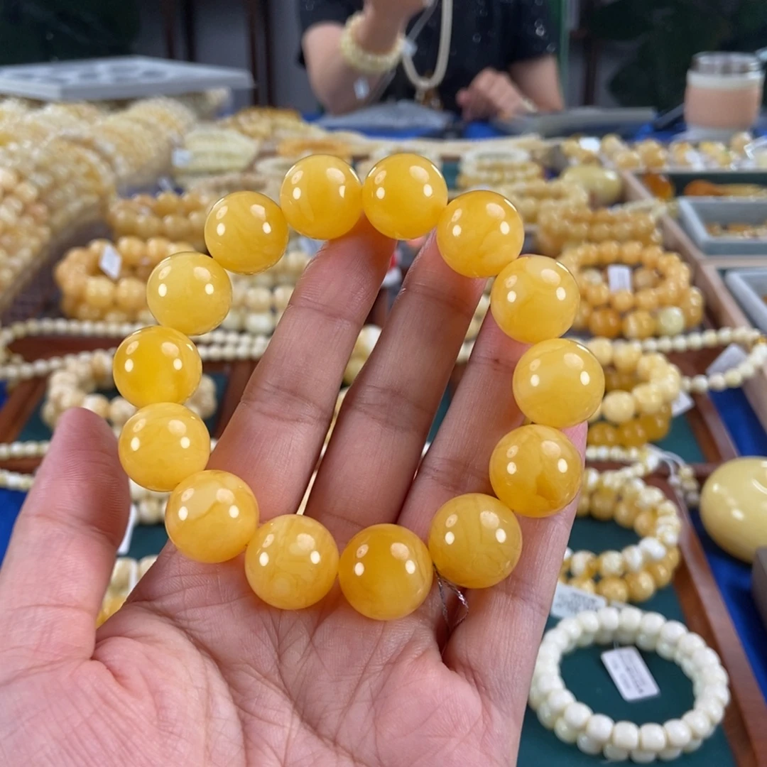 琥珀未镶嵌珠宝奇石16同料黄白花蜡圆珠34.68