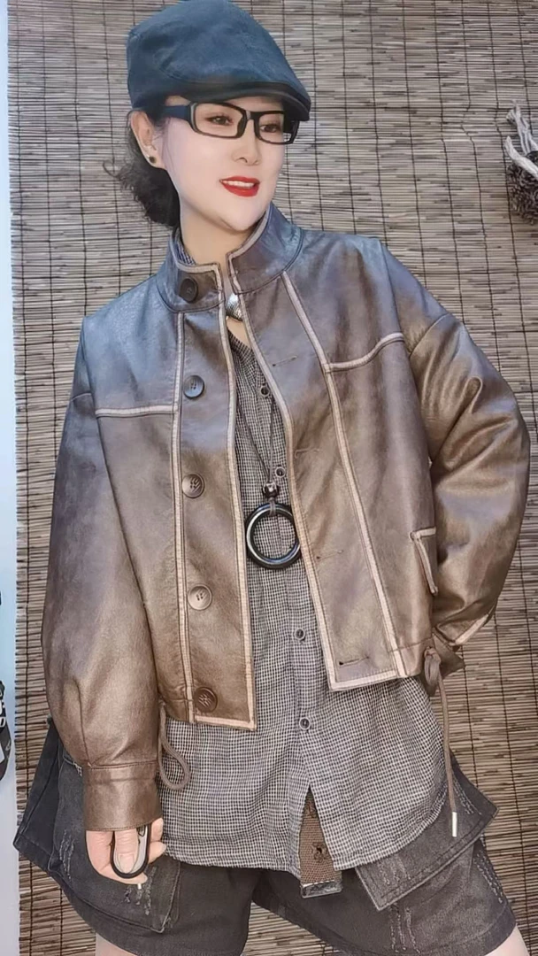 春秋款休闲时尚立领领单排扣下抽绳短款皮衣外套