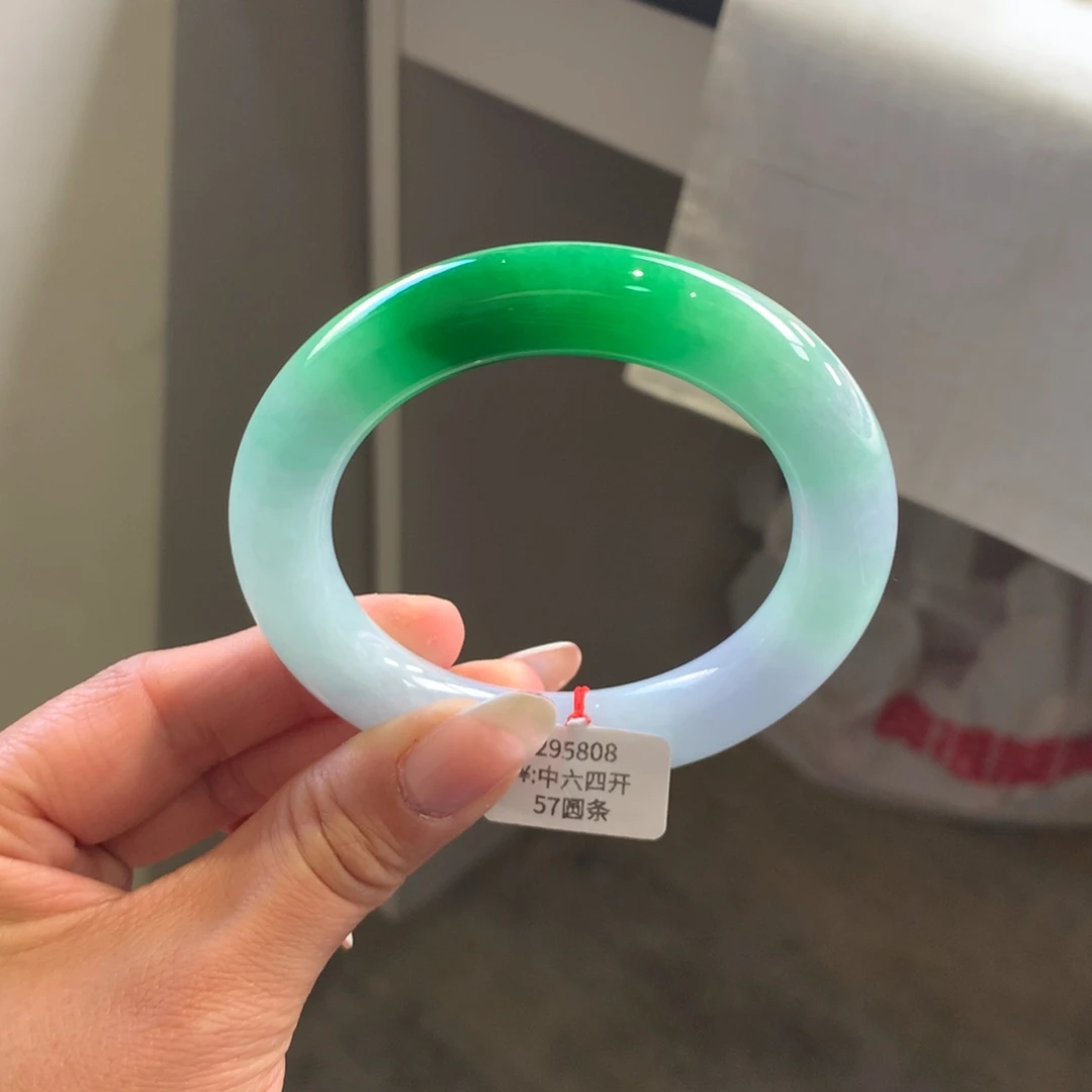 翡翠手镯未镶嵌糯化紫底飘辣阳绿57胖圆（具体询价）