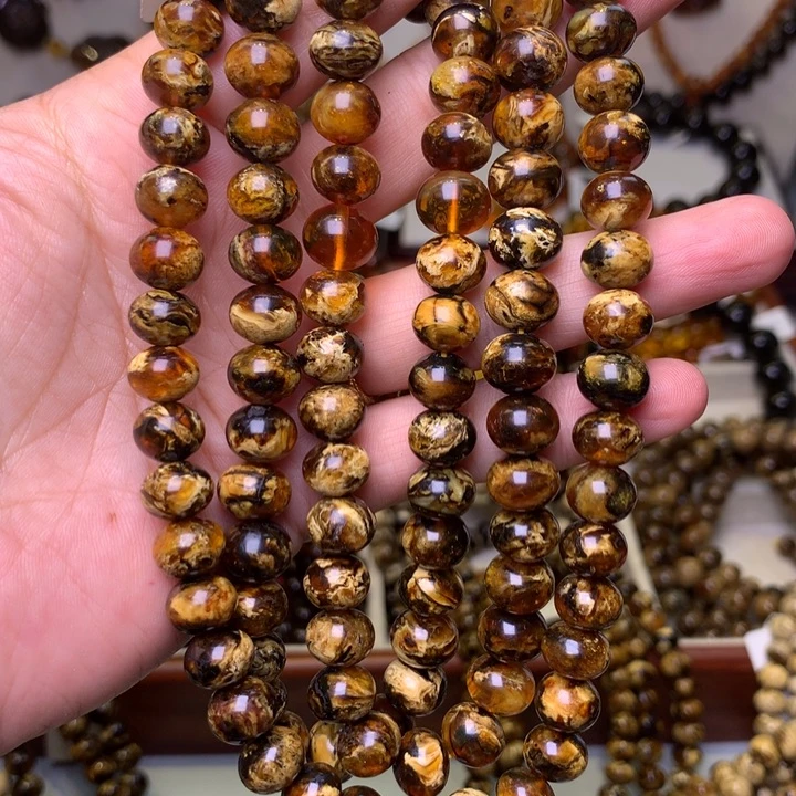 天***回裸石琥珀未镶嵌9+老黄花108