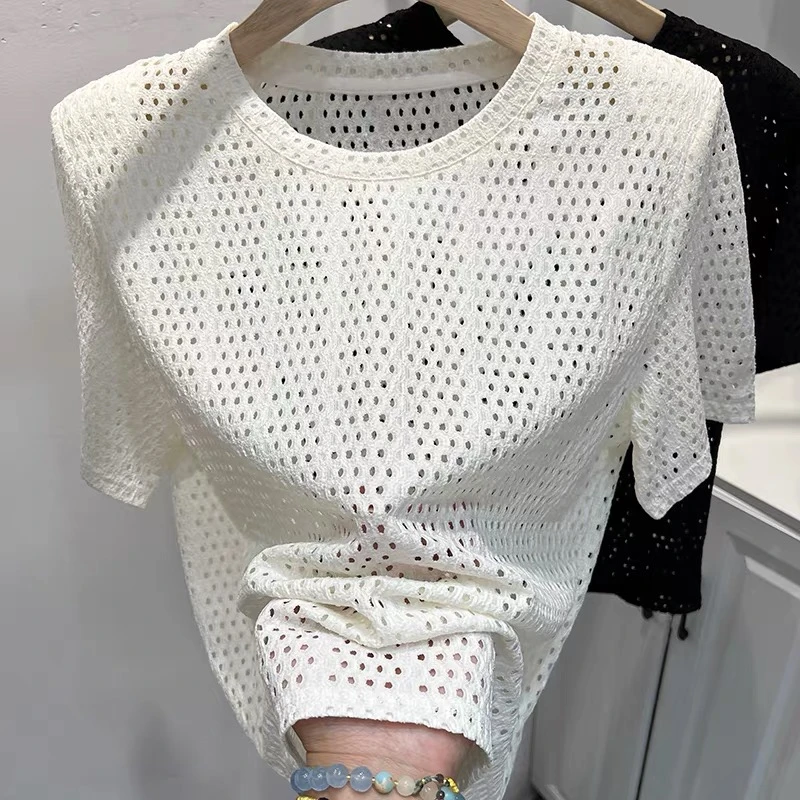 9017#复古镂空蕾丝衫女短款春夏季设计感下摆开叉垫肩短袖洞洞衣