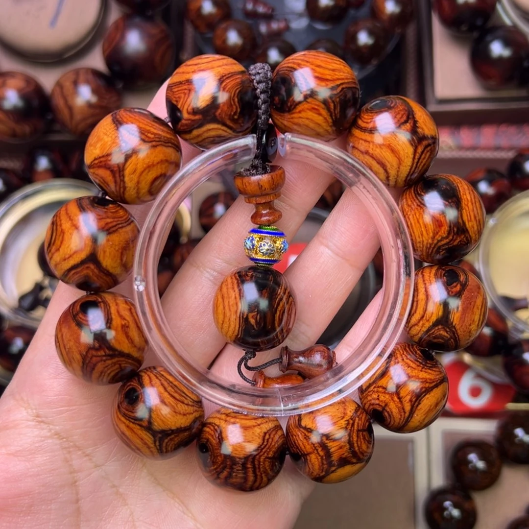 木质类黄花梨鬼脸对眼成品手串