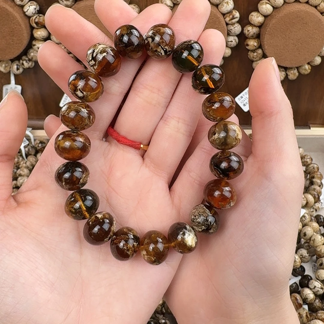 光***亮琥珀未镶嵌手链抚顺琥珀 干白溶洞