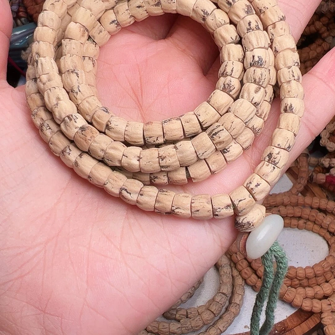 旋***子柏香籽/百香籽吊坠
