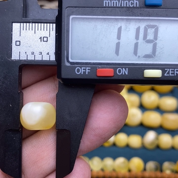 琥珀未镶嵌裸石46号11.9*9.1喇叭口微瑕
