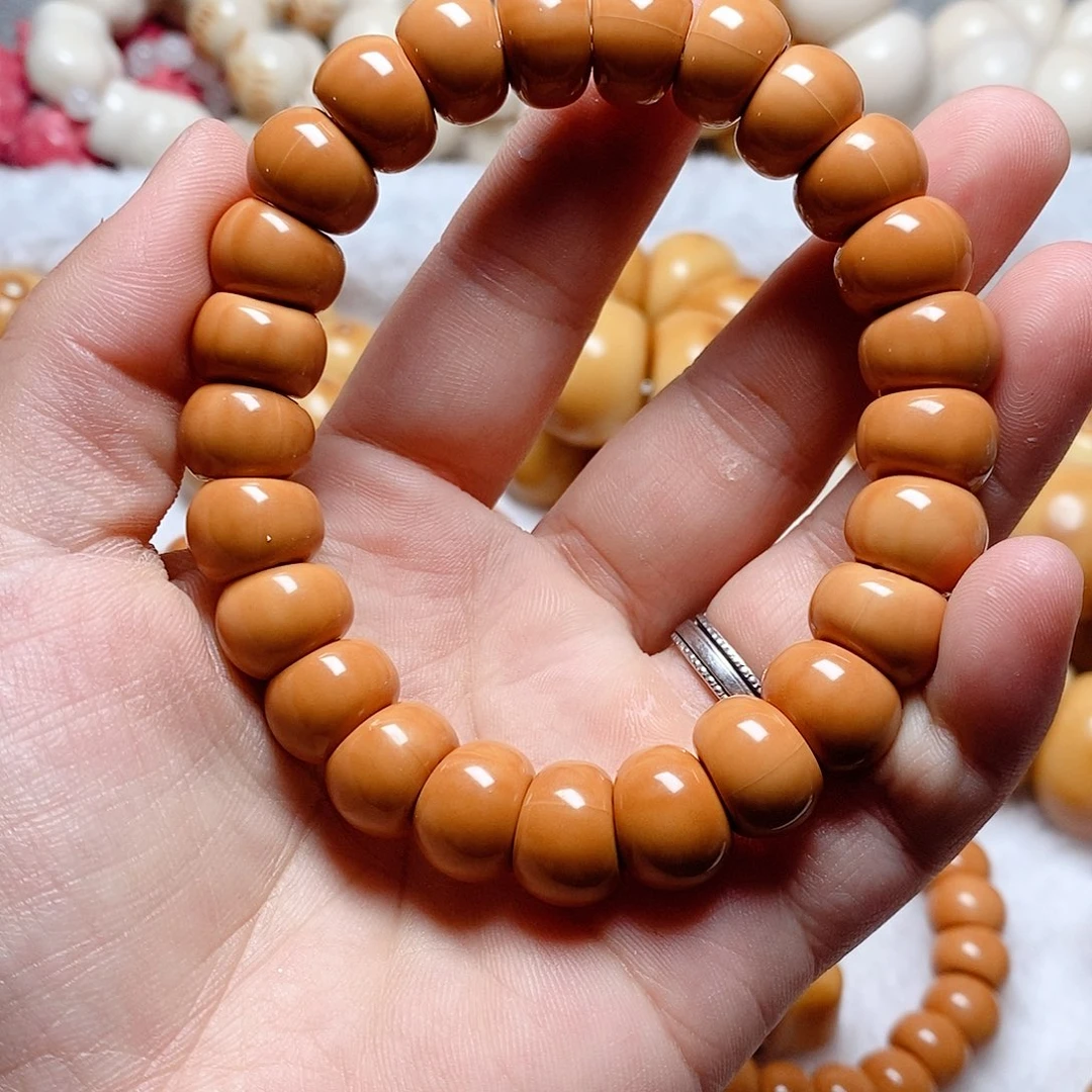 吊坠菩提根/象牙果全品光面大肠猴头手串