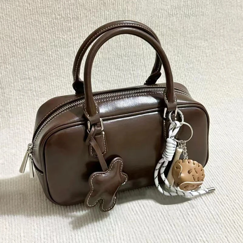 小众设计保龄球包包女2025秋冬新款复古手提包包单肩斜挎波士顿包