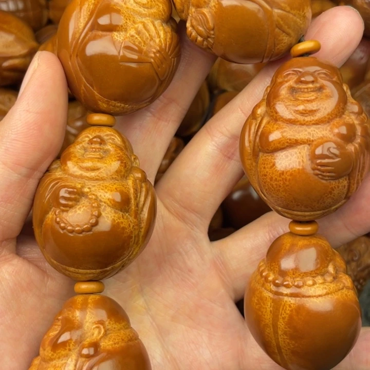 南***战文玩核桃吊坠橄榄核