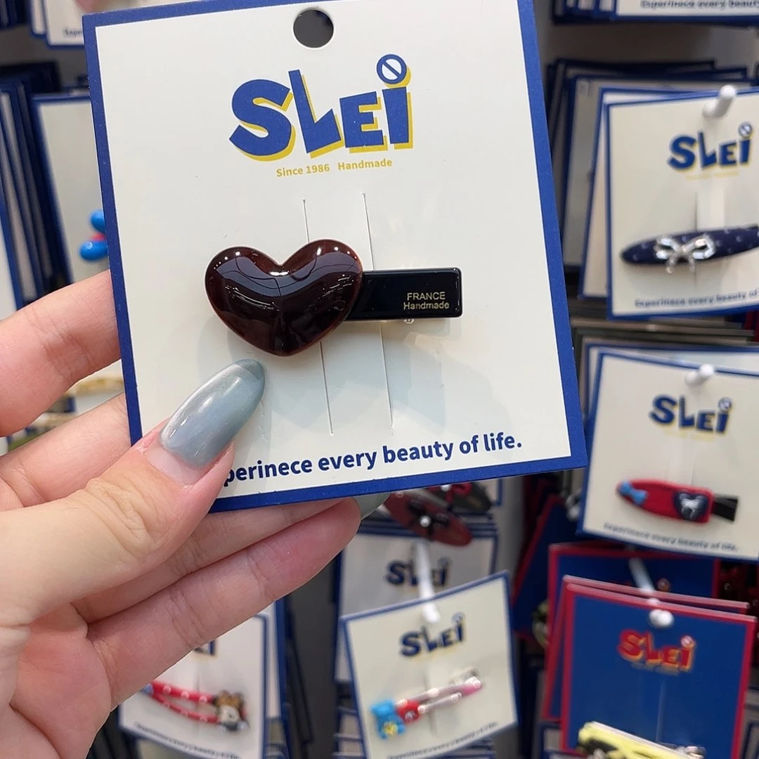 布艺非金属咖色爱心发夹