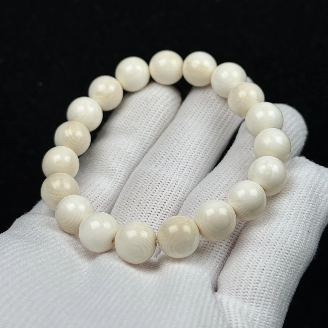 U3574天然猛犸牙 特价瑕疵手串9+mm支持复检假一罚十