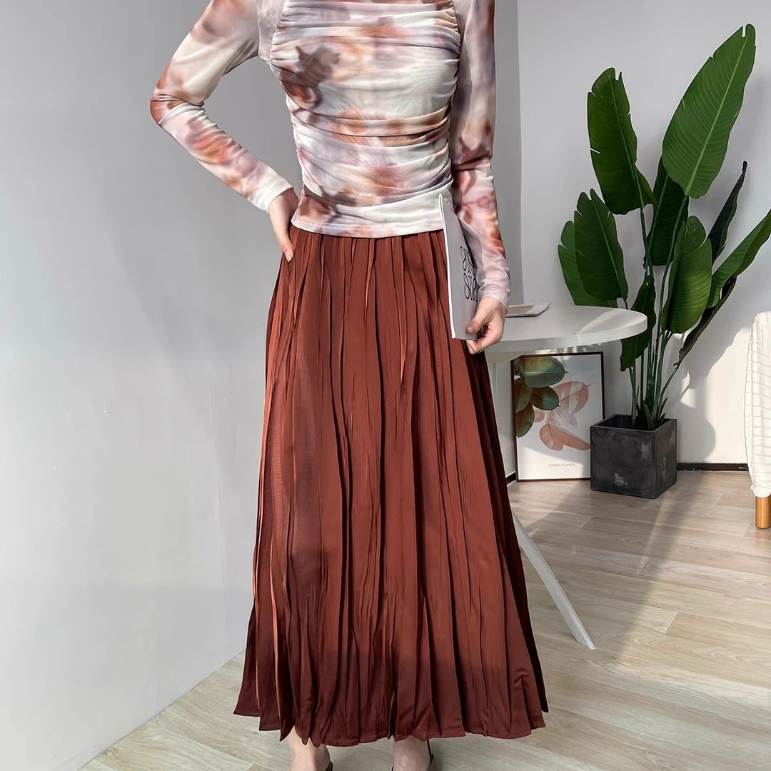 百褶半身裙女2025新款春秋高级感缎面高腰显瘦气质中长款a字长裙