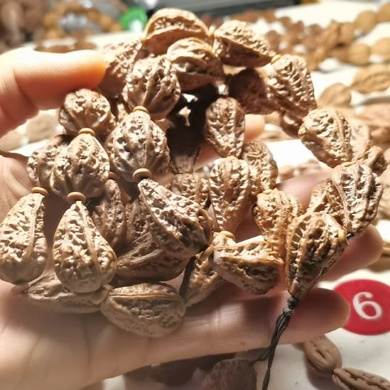 文玩核桃吊坠东北楸异形籽水滴25