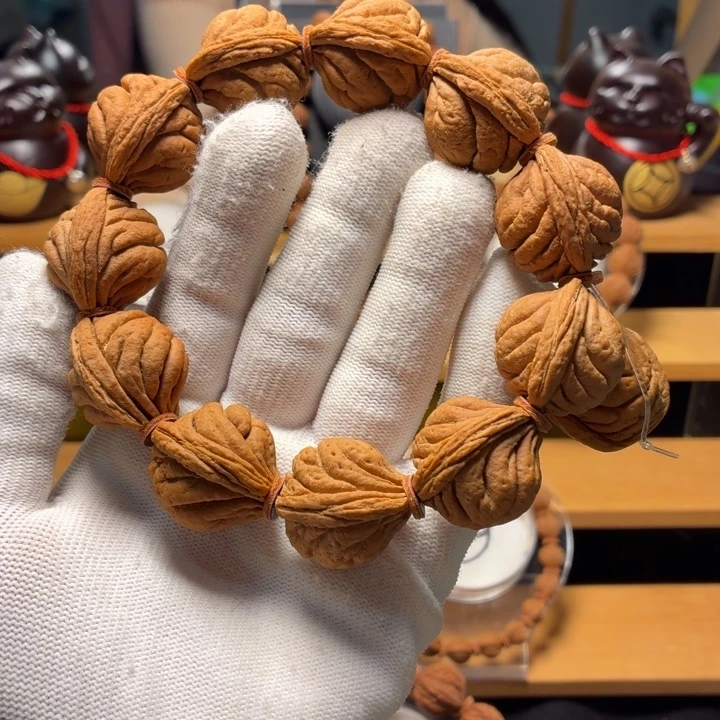 厚***蟹手串桃核霸王龙原桩手串