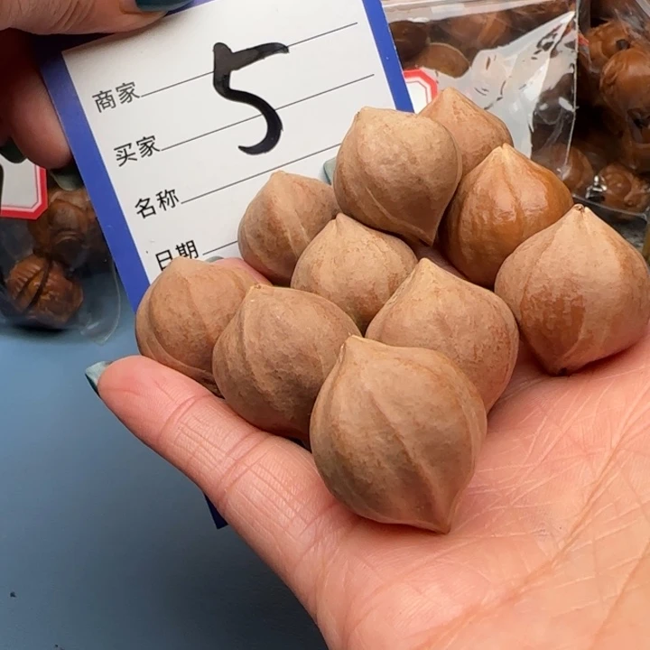 橄榄核手串尤**、橄榄核